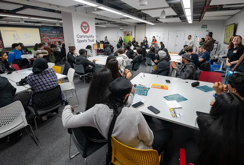 People attending an indoor community event.